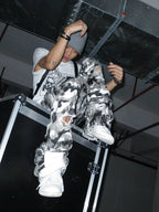 Waxed Camo Curved Flared Pants